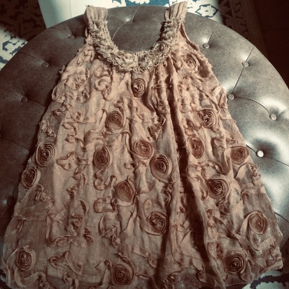 Pretty Angel light brown flowered dress.